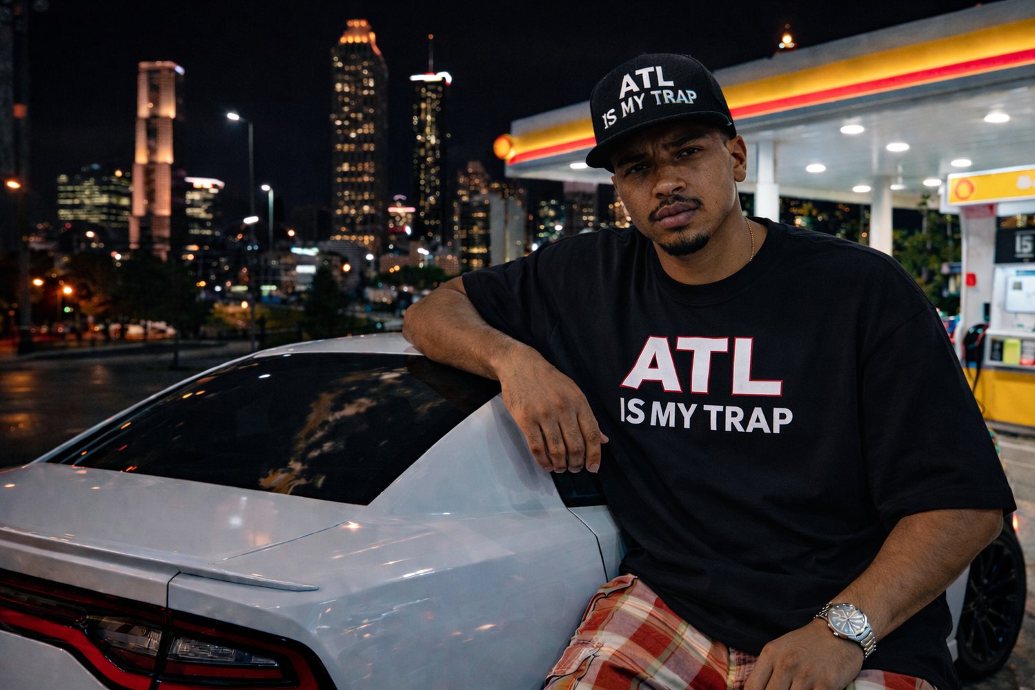 black shirt that says atlanta atl is my trap