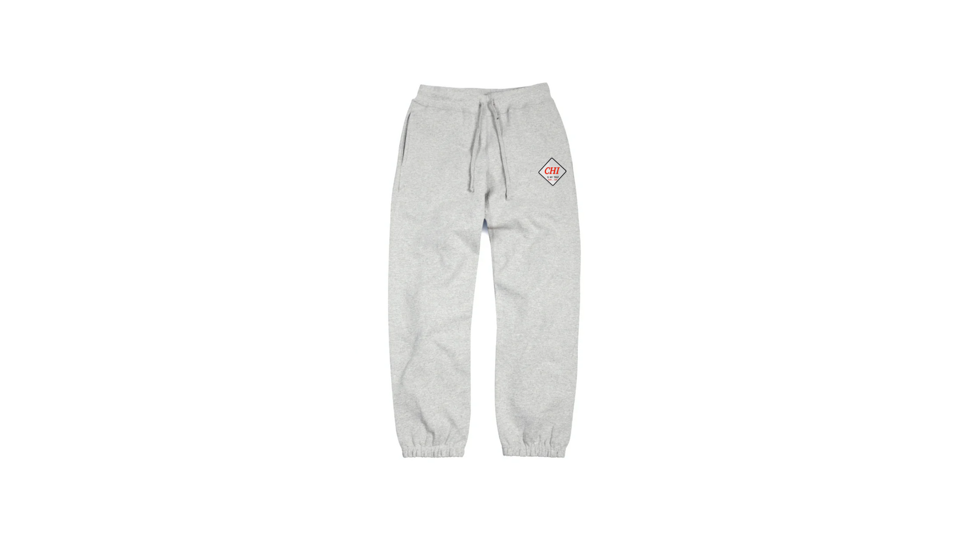 Grey "CHI IS MY TRAP" embroidered jogger pants featuring the "Chi is My 
Trap Sun–Sat" slogan stitched down the leg. Premium streetwear inspired by Chicago grind culture and everyday hustle.