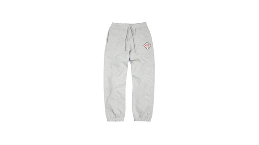 Grey "CHI IS MY TRAP" embroidered jogger pants featuring the "Chi is My 
Trap Sun–Sat" slogan stitched down the leg. Premium streetwear inspired by Chicago grind culture and everyday hustle.